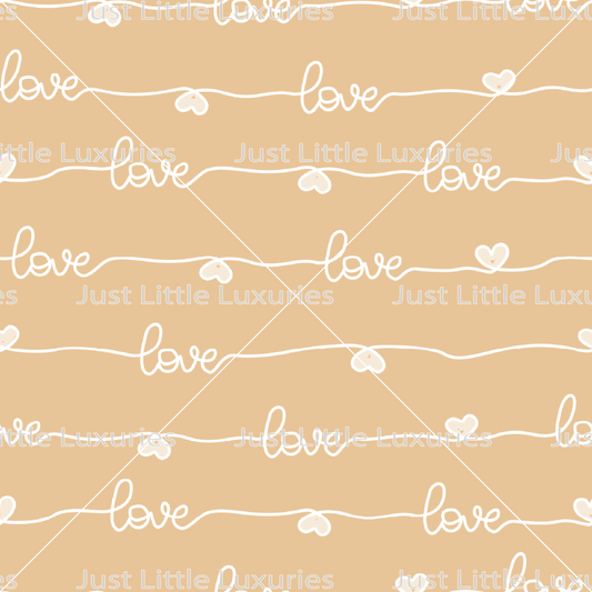 Handwritten white “love” text on a golden yellow background digital edible image